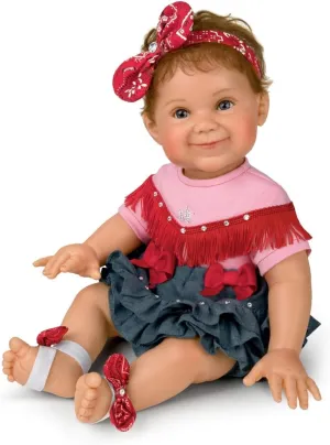 The Ashton-Drake Galleries Little Rhinestone Cowgirl Baby Doll by Ping Lau, 18 inches, Poseable with Real Touch Vinyl Skin (White, Red, Blue, Pink)
